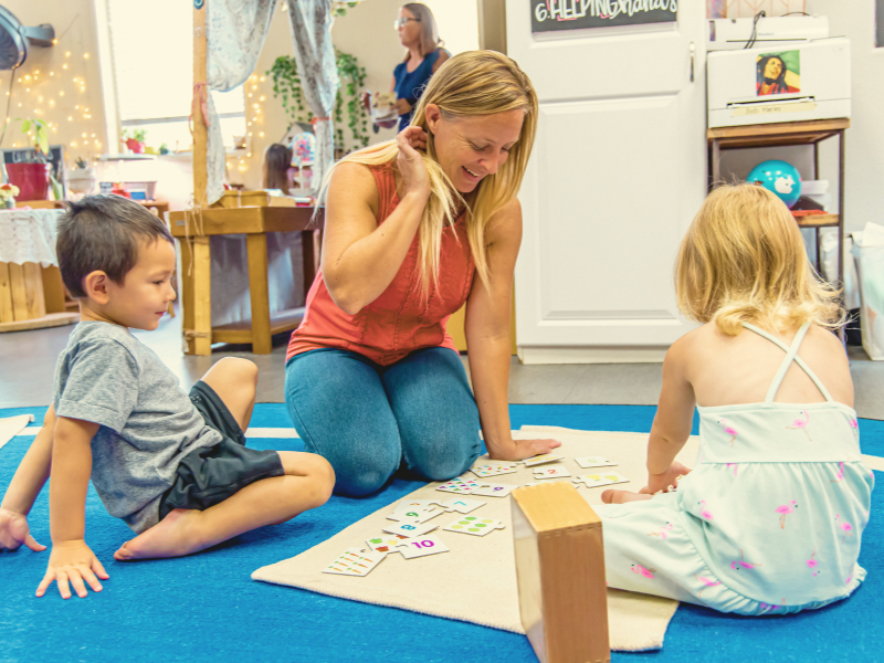Teacher working with students